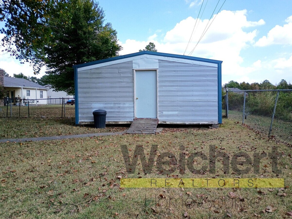 Photo - Updated 4-Bed Home with Fenced Yard & Carport