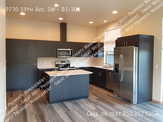 Building Photo - 9730 59th Ave SW Unit B1-301