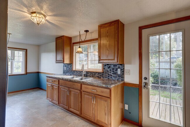 Photo - Charming 2-Bedroom Home with Bonus Room Ne...