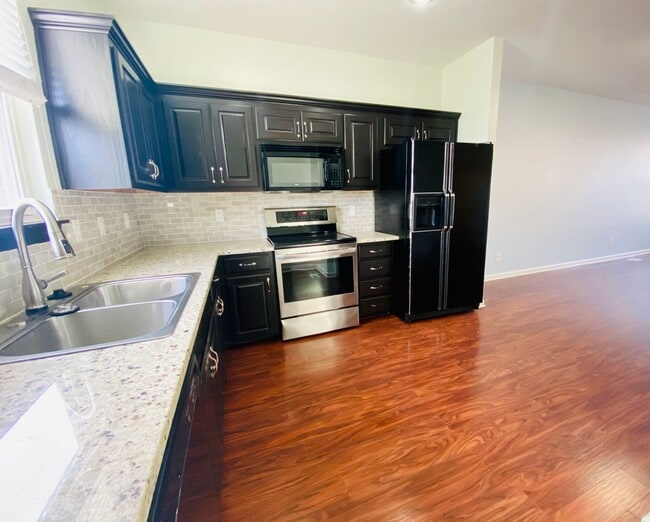 Photo - {12337} Spacious Stone Creek Village Townhouse + All Appliances Included + Lawn Care Included + 1...