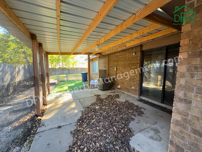 Photo - Cozy 3-Bedroom Home with Fireplace, Covered Patio & Large Fenced Backyard for Lease