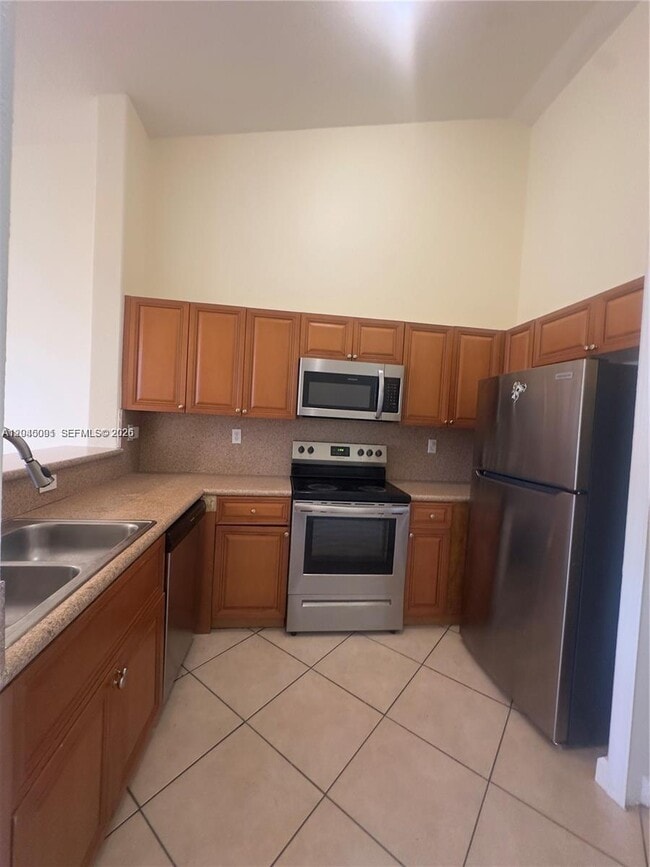 Building Photo - 1660 SE 29th St Unit 109