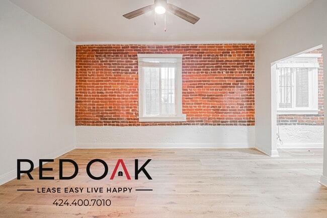 Building Photo - 516 N Harvard Blvd Unit 109