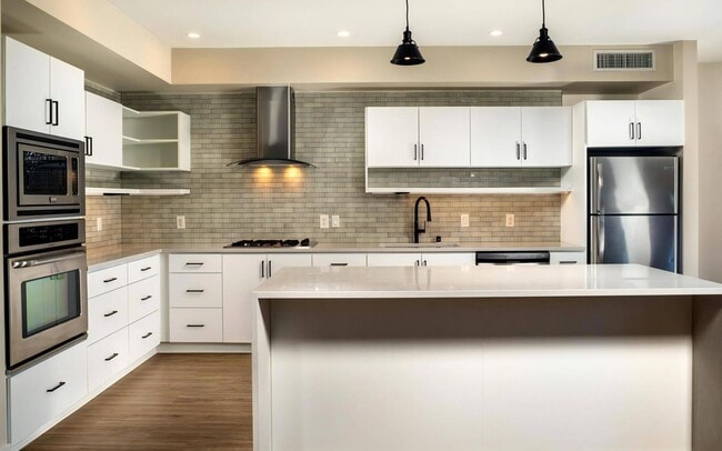 Gas burners and two ovens make this a kitchen built for real cooking.