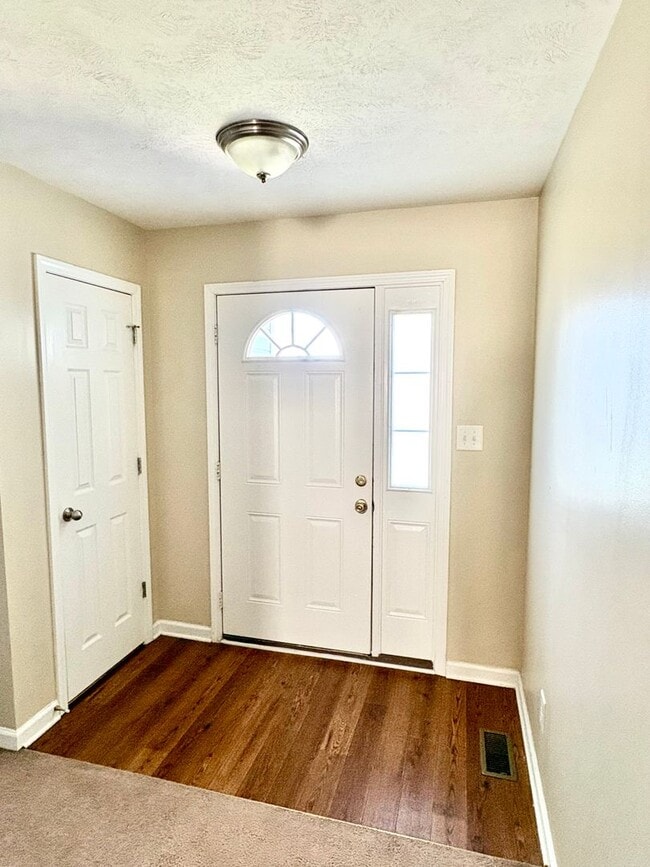 Photo - Nice home awaiting you to call home today- close to shopping and dining