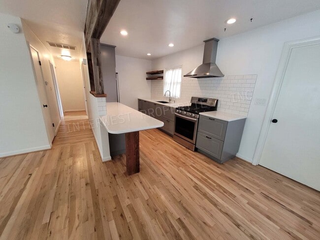 Photo - Beautiful 3 bdrm Home w/ a remodeled kitchen, stainless appliances, deck, yard and more!!!