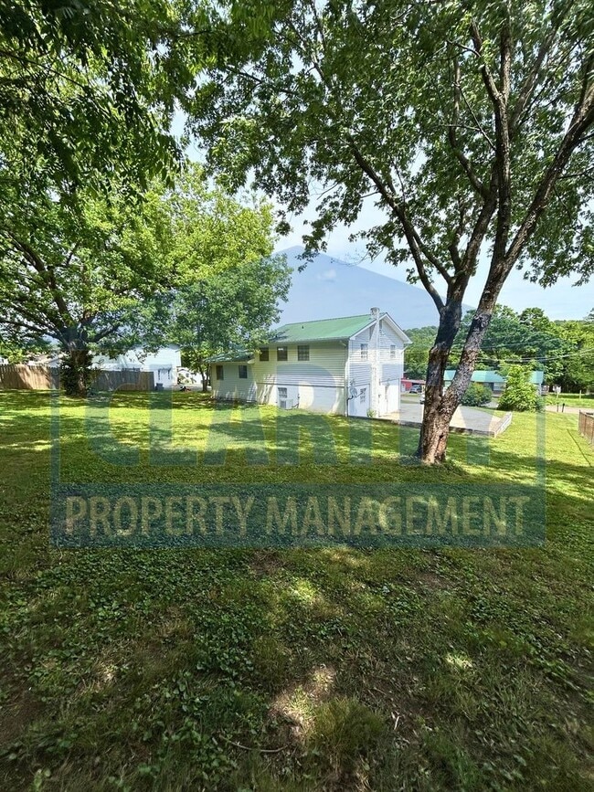 Photo - House with basement garage!