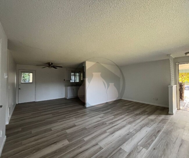 Photo - Single Level Triplex Ready to move In!