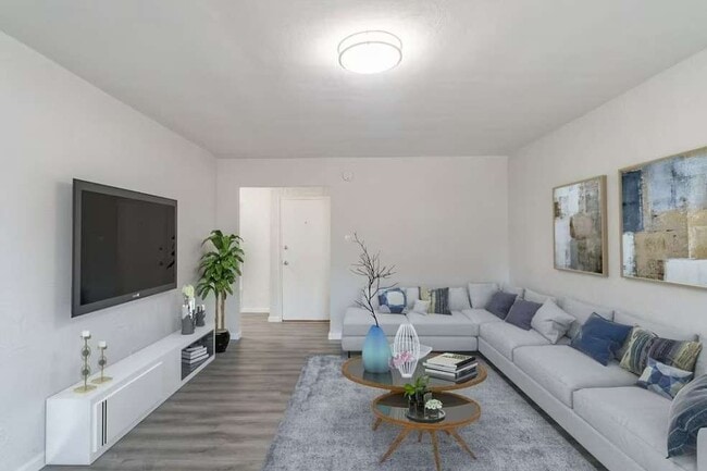 Sala de estar - Tall Tree Village Apartments