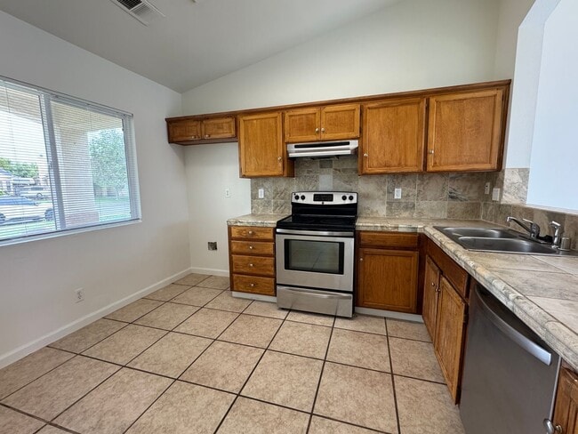 Photo - Three Bed, Two Bath Home with Two Car Garage