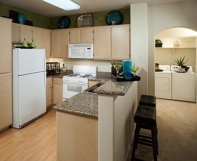 Open Kitchen with Breakfast Bar - Waterford Place Apartments