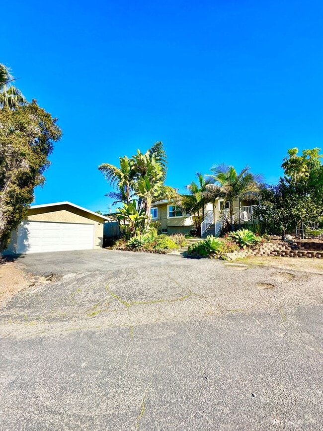 Photo - Beautiful Craftsman-style Home with fenced yard space, detached garage and additional parking in ...