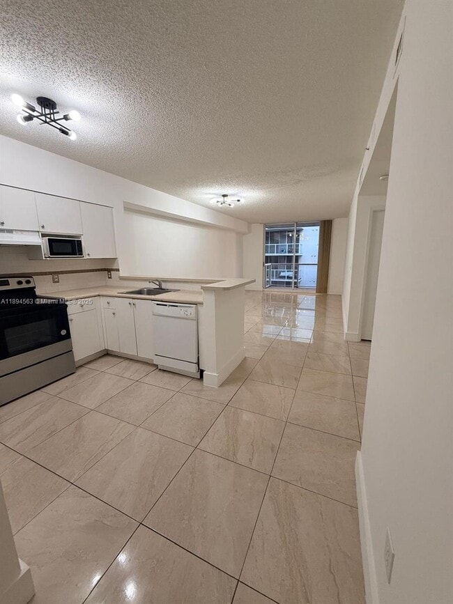 Building Photo - 5091 NW 7th St Unit 1009