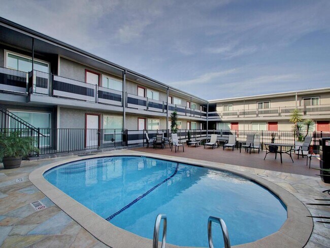 Building Photo - 3110 Red River St Unit 306