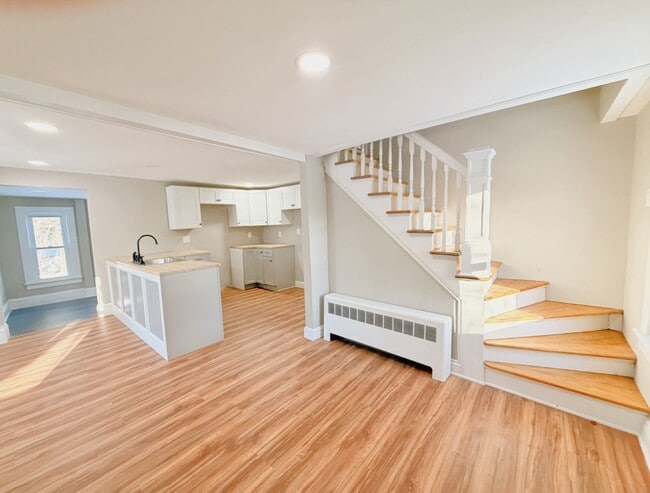 Photo - Modern Renovated 2-Bedroom Single-Family Home with Large Yard and Laundry Hook-Ups