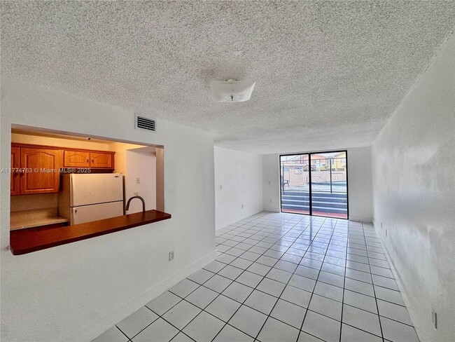 Building Photo - 9678 Fontainebleau Blvd Unit 111-111 Rental