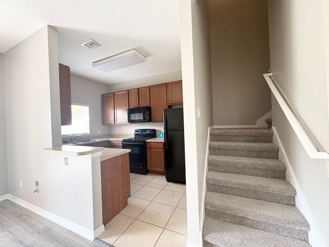 Photo - Gated 3B/2.5B Sanford Townhome ~ Fresh paint! ~ New flooring!