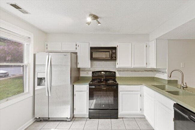 Photo - Move in ready! North Raleigh Town Home For...