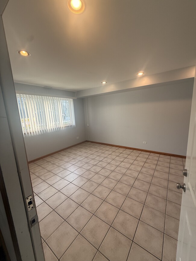 Sala de estar - 6038 W 63rd St Unidad 1