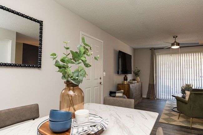 Dining area & living room with hardwood style flooring
