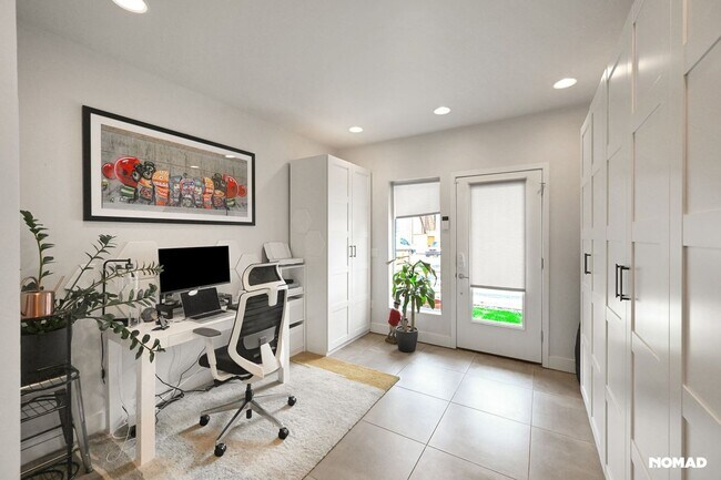 Photo - Modern 2-Bedroom Townhome with Rooftop Ret...
