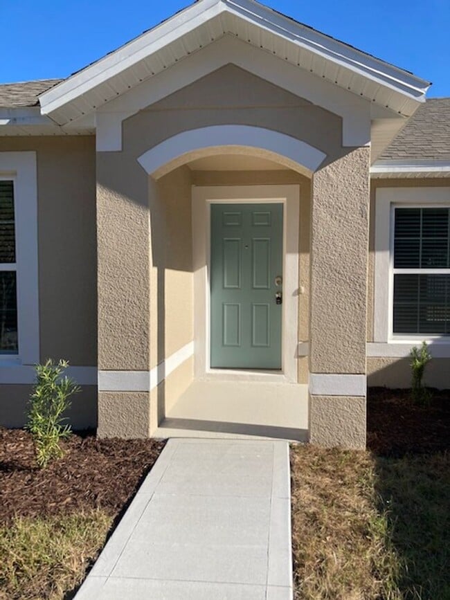 Photo - Like new 3/2/2 with screened in porch! Located close to the beach, shopping, parks and so much mo...