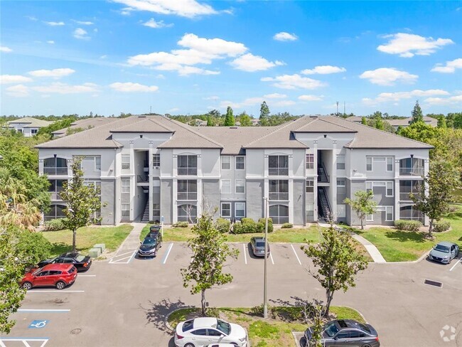 Building Photo - 5513 Legacy Crescent Pl Unit 303 Rental