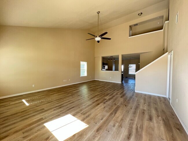 Living room with soaring vaulted ceiling - 104 Denton Dr