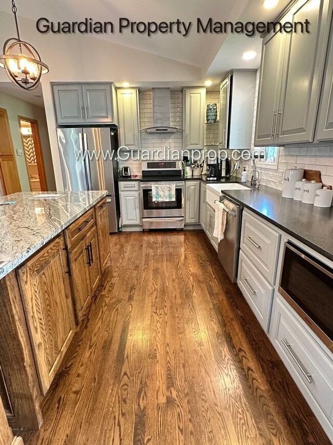 Photo - Maple Grove Single Family Home, Fenced Yard, 3 Car Garage, Deck, Available 7-31