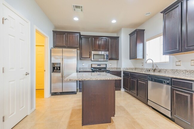 Photo - Inviting 4 Bed 2 Bath Home - Solar Panels & In The Golf Course Area!