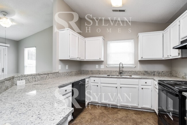 Photo - This home exudes a cheerful and welcoming charm!