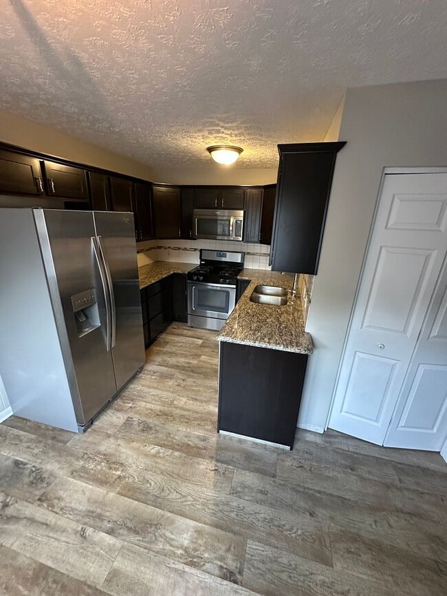 Photo - Updated 3 Bed 1.5 Bath Townhome with basement.