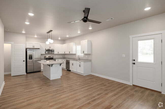 3BR, 2.5BA - 1,630SF - Living Room - Birdmaster Drive