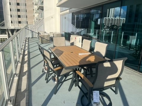 new table and couch for the lanai - 1500 Rycroft St Unit 312R