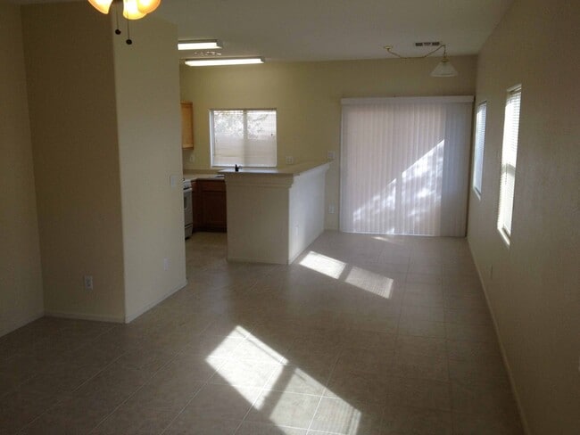 Photo - Two Story townhouse with one car garage.