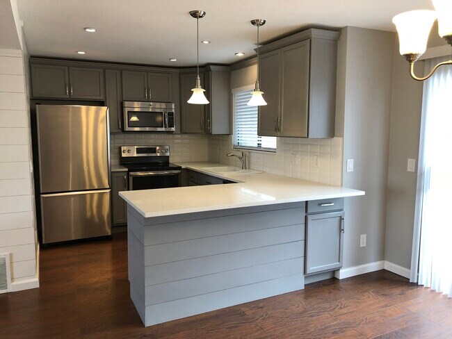 Main Floor kitchen - Stainless and Quartz countertops - 422 Wright St