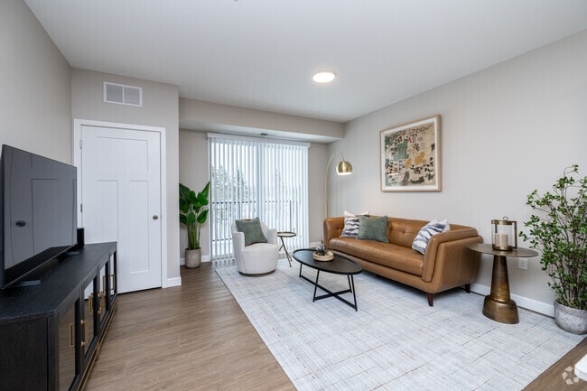 1BR, 1BA + Den - 886SF - Living Room - The Murphy
