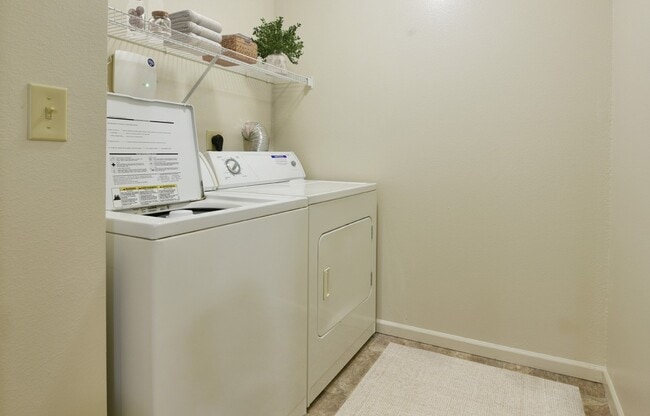 The in-unit washer and dryer at Heatherwood Apartments, Grand Blanc, Michigan