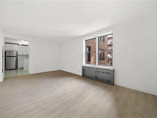 Building Photo - 1213 Avenue Z Unit C28