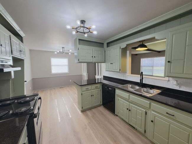 Photo - Updated 3-Bedroom, 2-Bathroom Duplex with a Spacious Fenced Backyard!