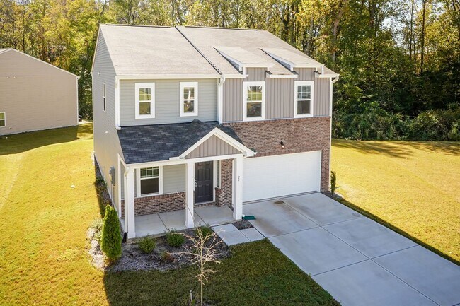 Photo - Spacious 4-Bedroom Home with Open Layout