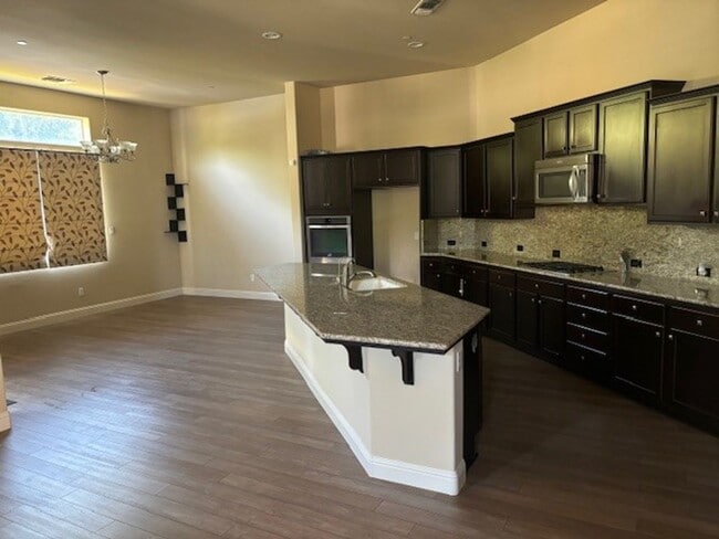 Photo - Elegant 4-Bedroom Home with Paid Solar in ...