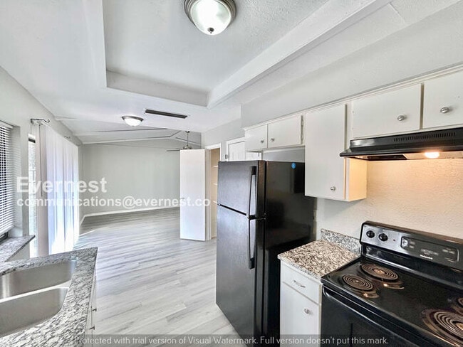 Photo - 3 Bed, 2 Bath Home with Fenced Yard & Garage / Pet-Friendly / Available Now!