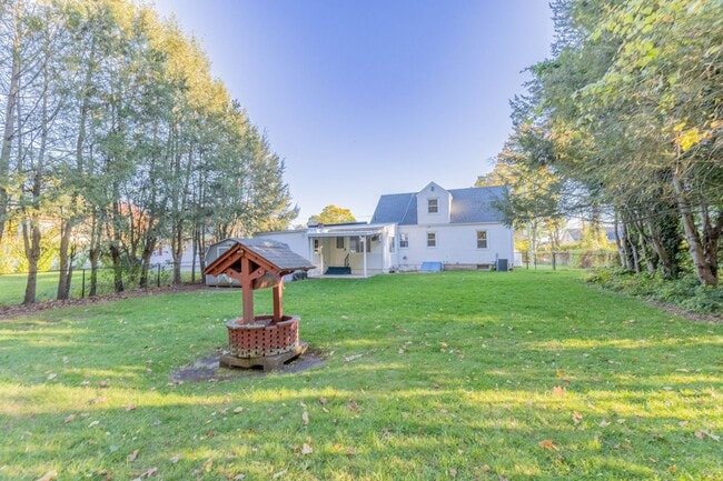 Photo - Charming 3-Bedroom Home with Solar Panels ...