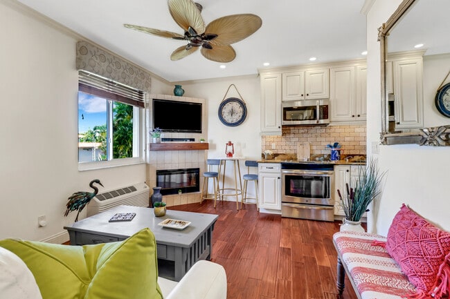 Living area looks out to the Marina - 25000 Tamiami Trl E Unidad F275 Rental