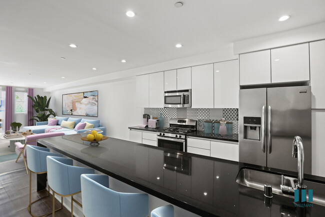 Kitchen with Large-Size Countertop Bar - Kelton Alexander Apartments