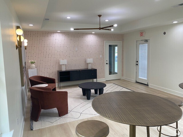 Gather with friends in the chic clubhouse - Summerfield Apartments