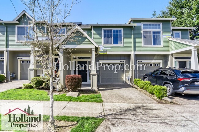 Building Photo - Live in Style: Updated Townhome with Amenities & Ideal Location