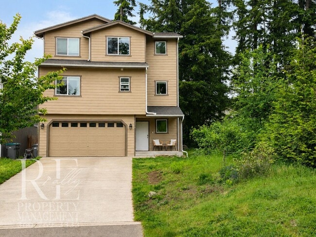 Building Photo - Spacious 3-Story Home with Flexible Living Space, Heat Pump & Private Deck Retreat