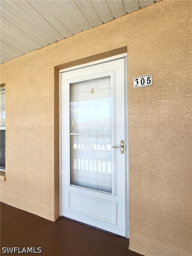 Building Photo - 9640 Victoria Ln Unit 305